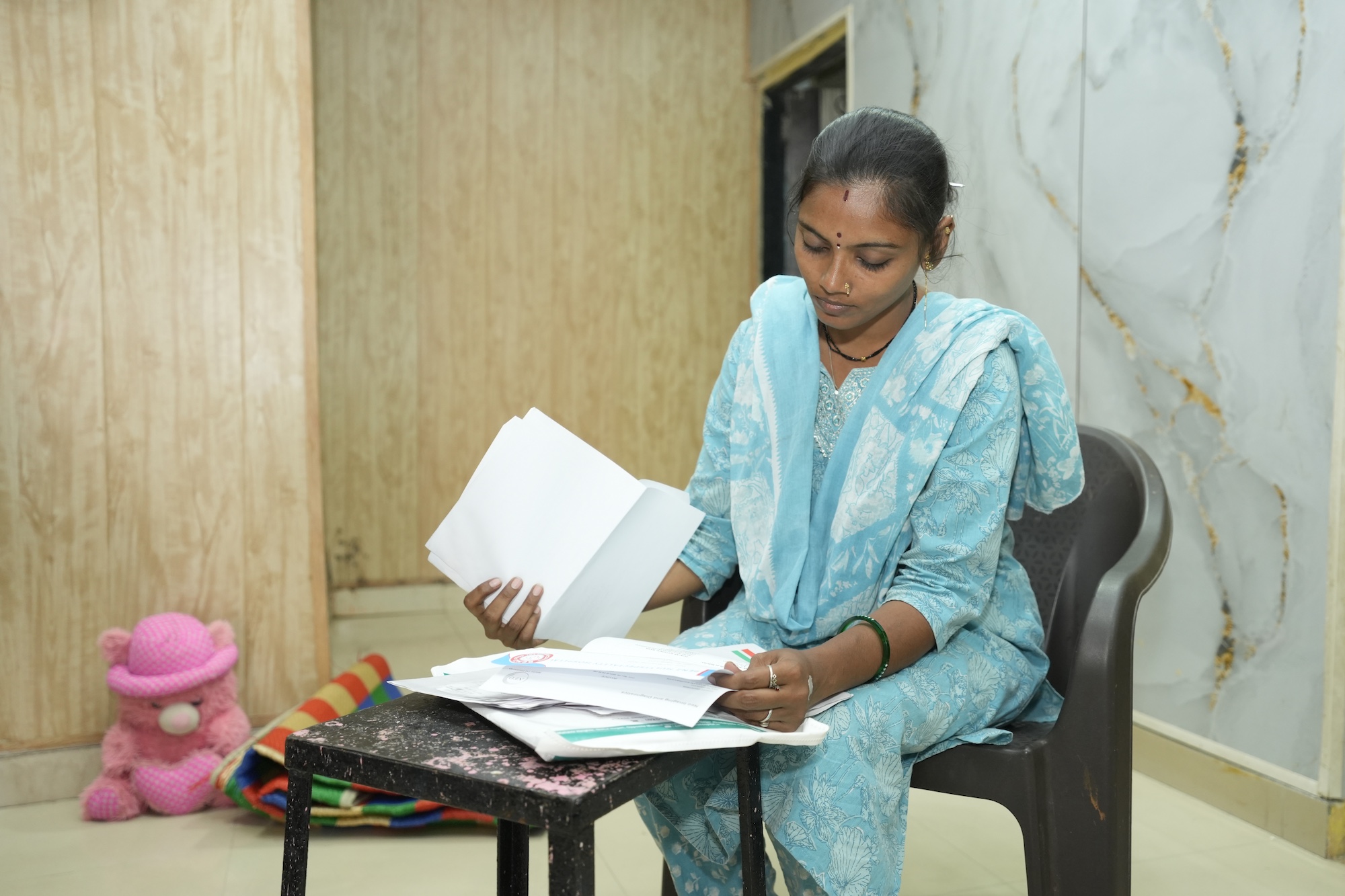 Kavita doing paperwork